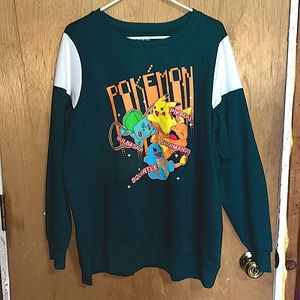 New, unworn, without tags, 2X Torrid Pokémon green and white crew neck.